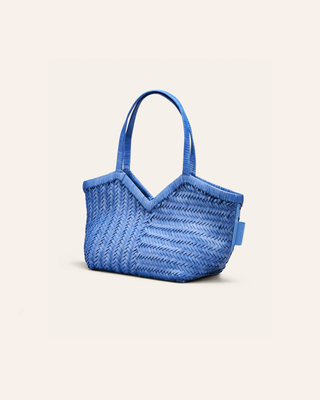 Cala Jade Humi S - Blue woven handbag on a beige background