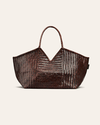 Cala Jade brown woven handbag on a light beige background