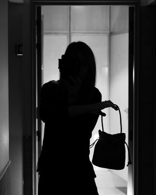 Cala Jade Jael pouch on a person