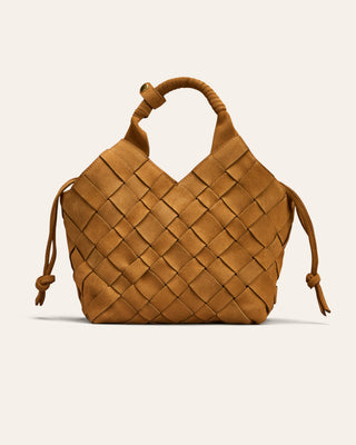 Brown woven suede handbag on a light beige background