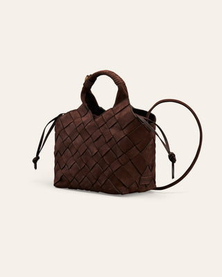 A brown woven nubuck shoulder bag on a beige background