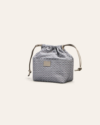 Cala Jade Small drawstring cotton bag with geometric pattern on a light gray background