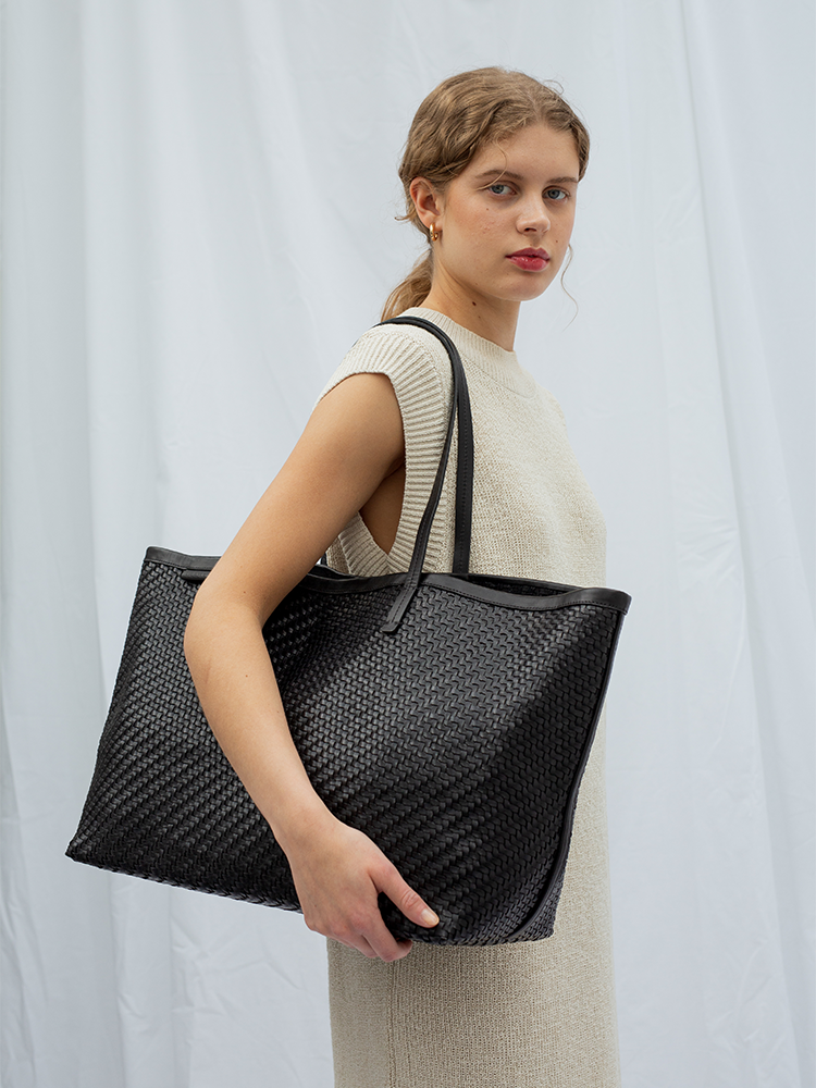 Cala Jade ISAI leather shopper bag on model 1