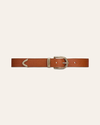 A slim brown leather belt with a textured finish, featuring a silver-tone metal buckle, keeper, and tip, displayed horizontally on a light cream background.