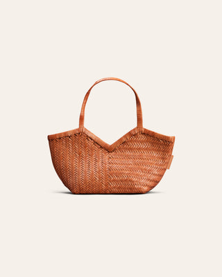 A small woven leather handbag in a warm tan-brown color, featuring a V-shaped top and a single shoulder strap, set against a solid off-white background.