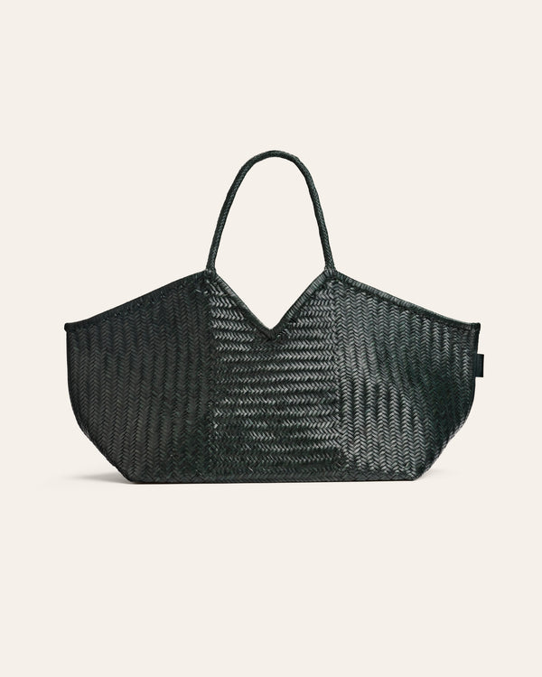 Dark Green woven handbag on a beige background