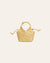 Small woven yellow handbag on a light beige background