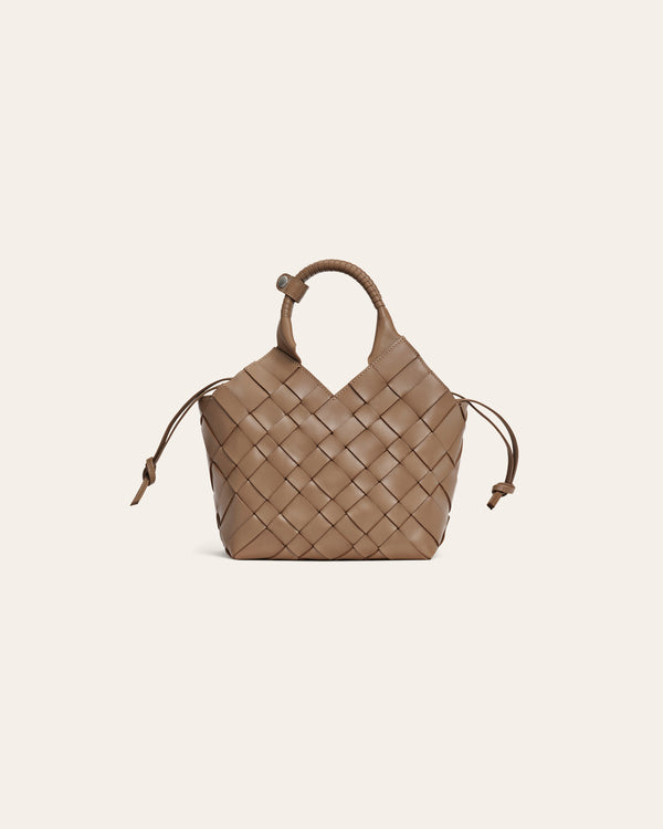 Dark beige woven handbag on a light beige background