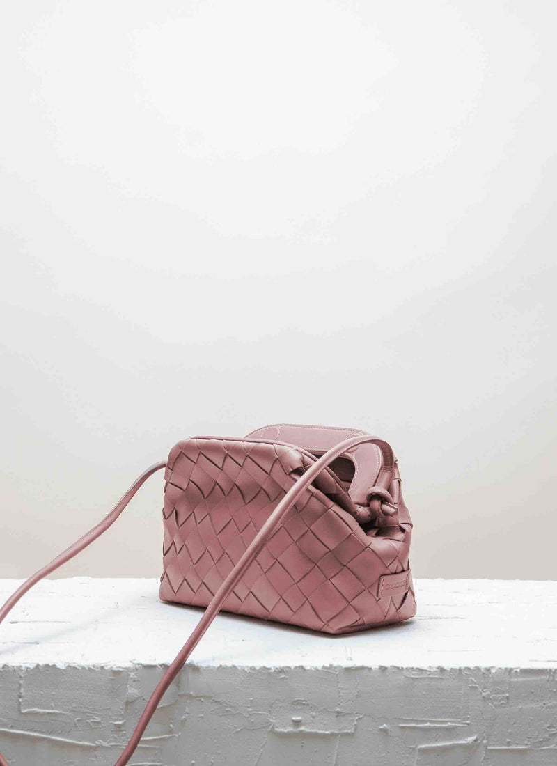 Cala Jade warm blush leather clutch