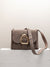 Cala jade Nami nubuck shoulder bag in light brown with a gold buckle