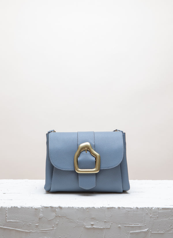 nami mini in blue with a gold buckle
